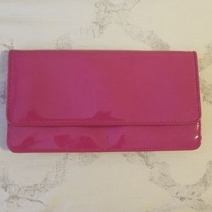 Pink patent leather clutch